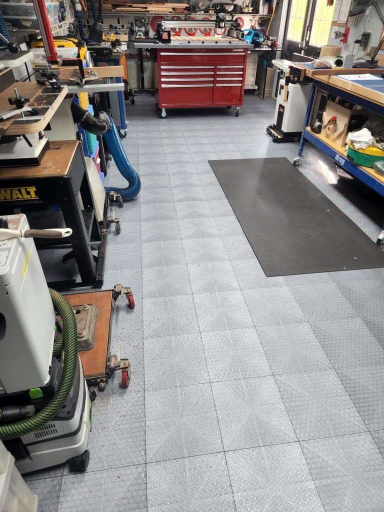 alloy TrueLock HDXT coin tiles in workshop featuring rolling toolbox