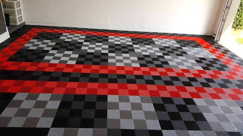 great garage floor tile project with red border