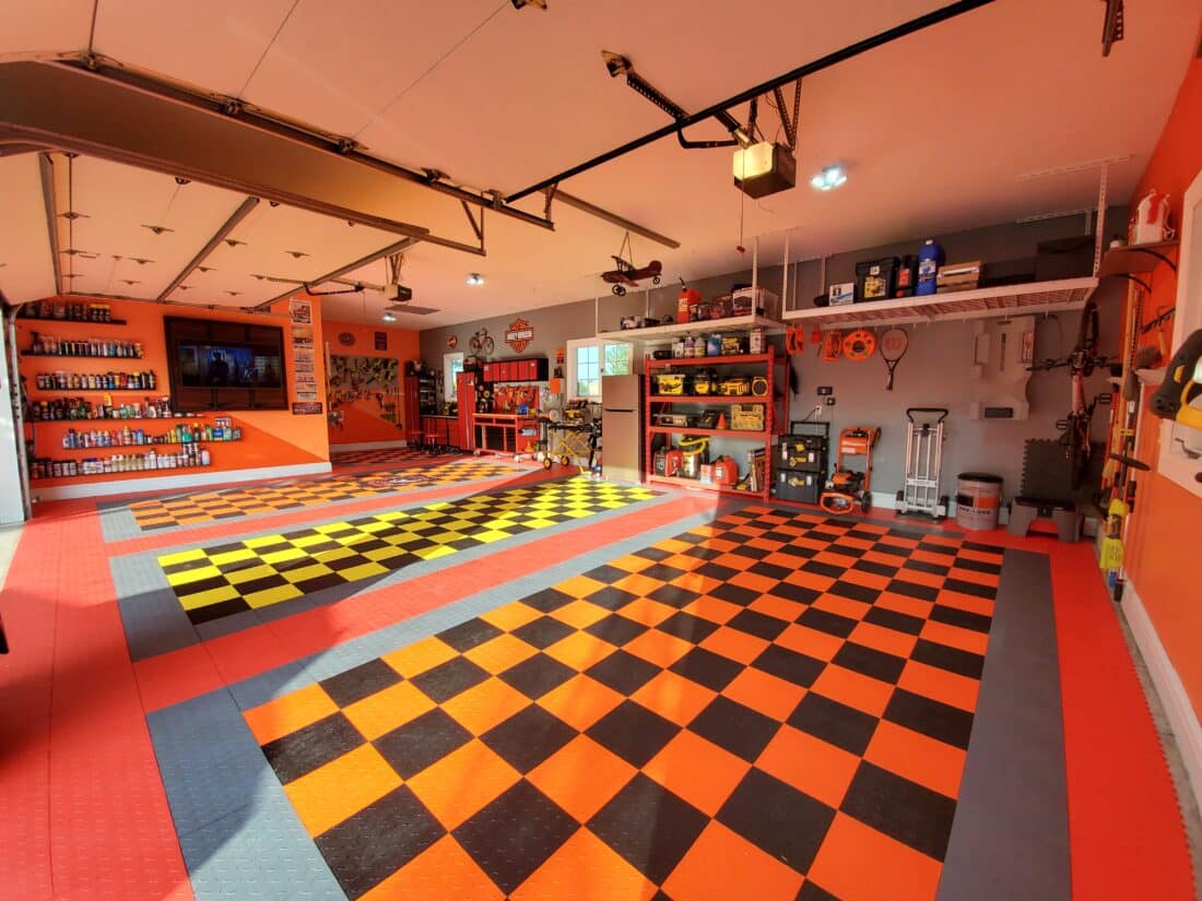 Orange and Black Checkerboard TrueLock Diamond tiles in Workshop. Best Garages of 2021 Collection