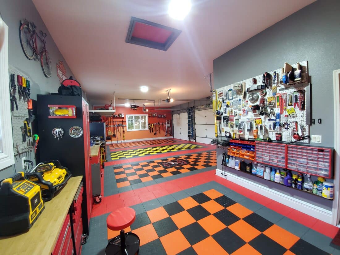Orange And Black TrueLock Diamondtiles in a garage