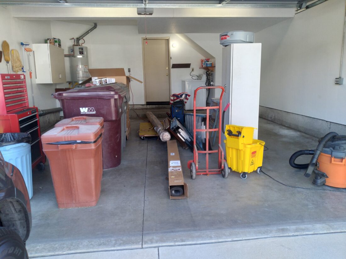 Messy Garage on Bare Concrete