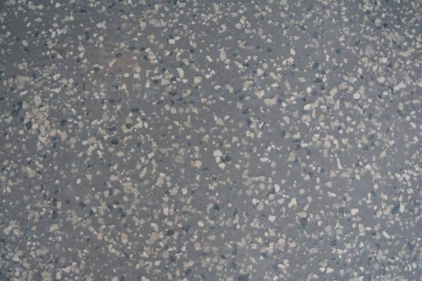 Close up of garage floor coating and flake