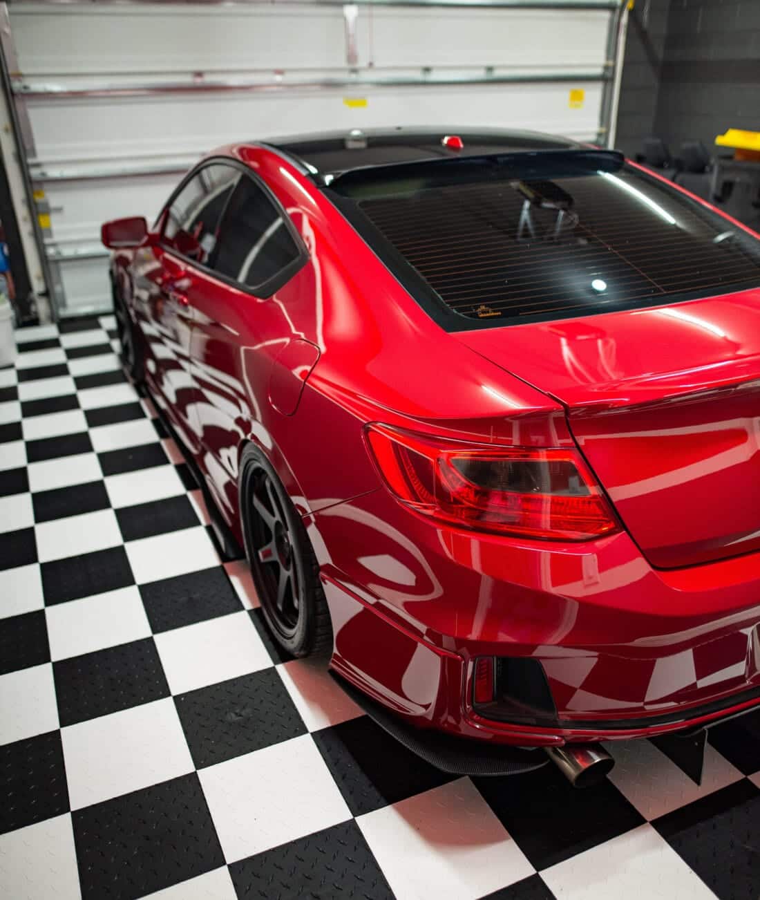 checkerboard tiles with red car
