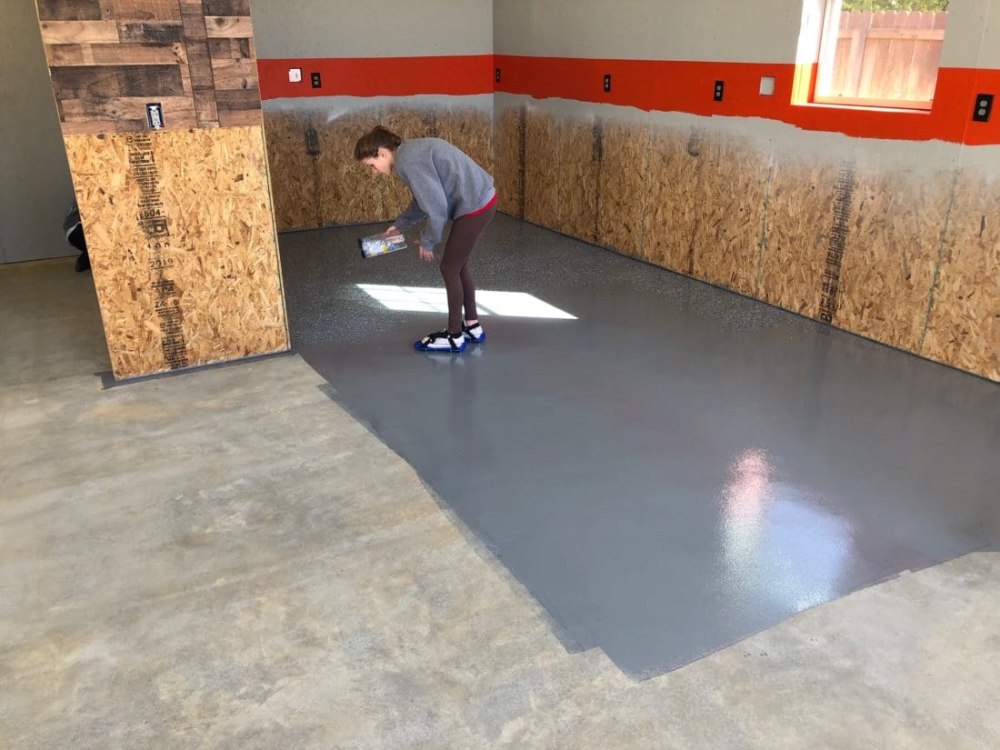 applying flake to garage floor coating