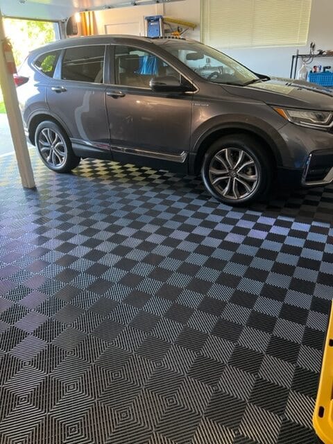 Grey car on TrueLock HDXT Graphite Ribbed Tiles