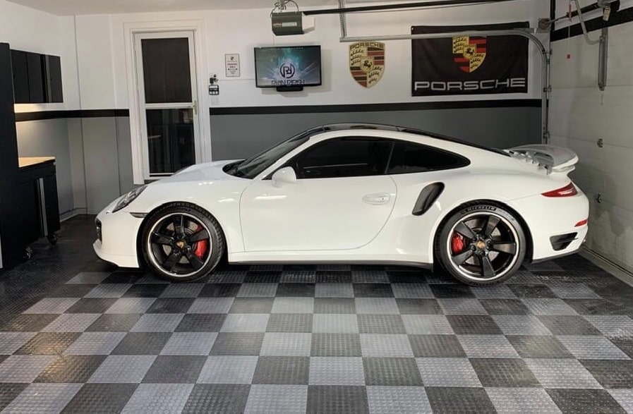 Black and Grey Checkerboard Tiles with White Car