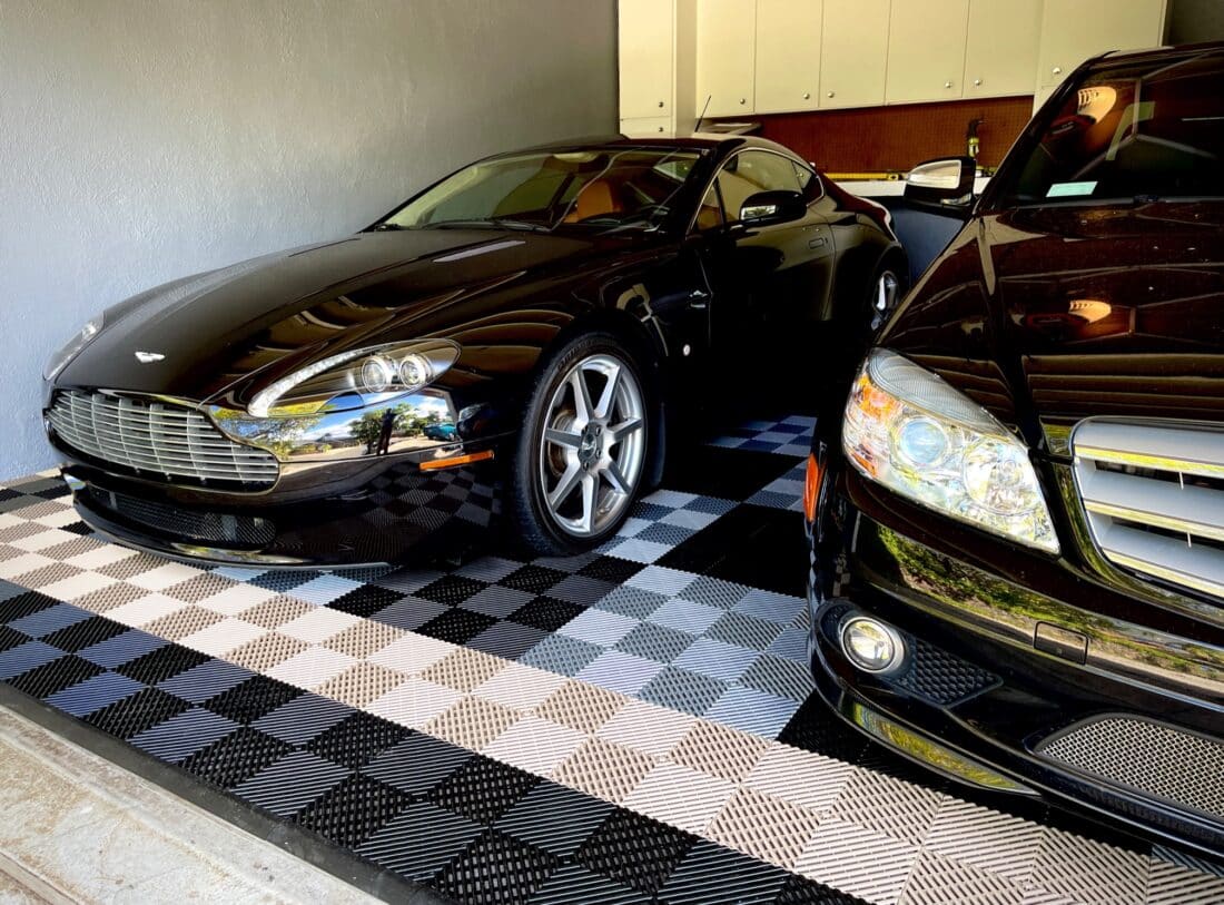 Two Black Cars on Black,Alloy, Beige RaceDeckÂ® Free-FlowÂ®Tiles