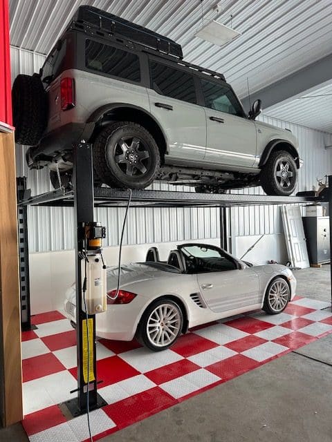 Red and white diamond tile pad with cool cars