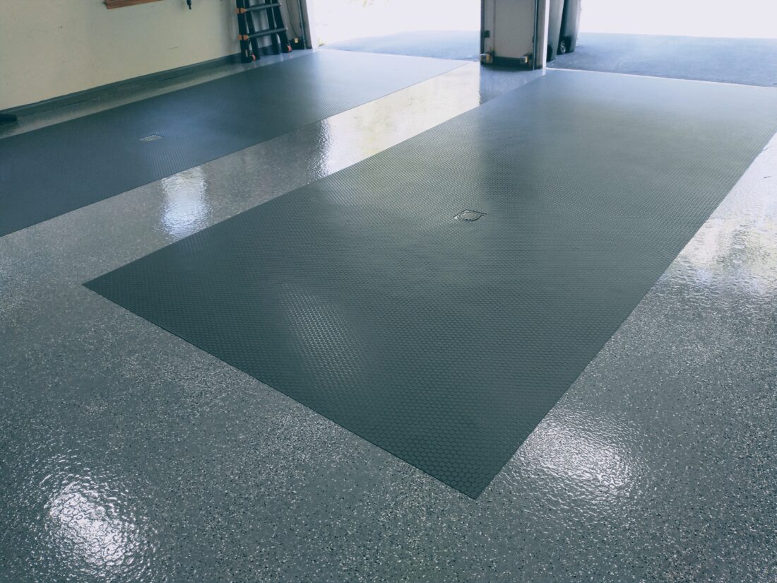 Grey small coin mats on grey epxoy.