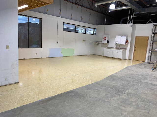 Garage with half bare concrete and half polyurea