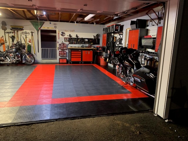 Red, grey, and black garage floor tiles